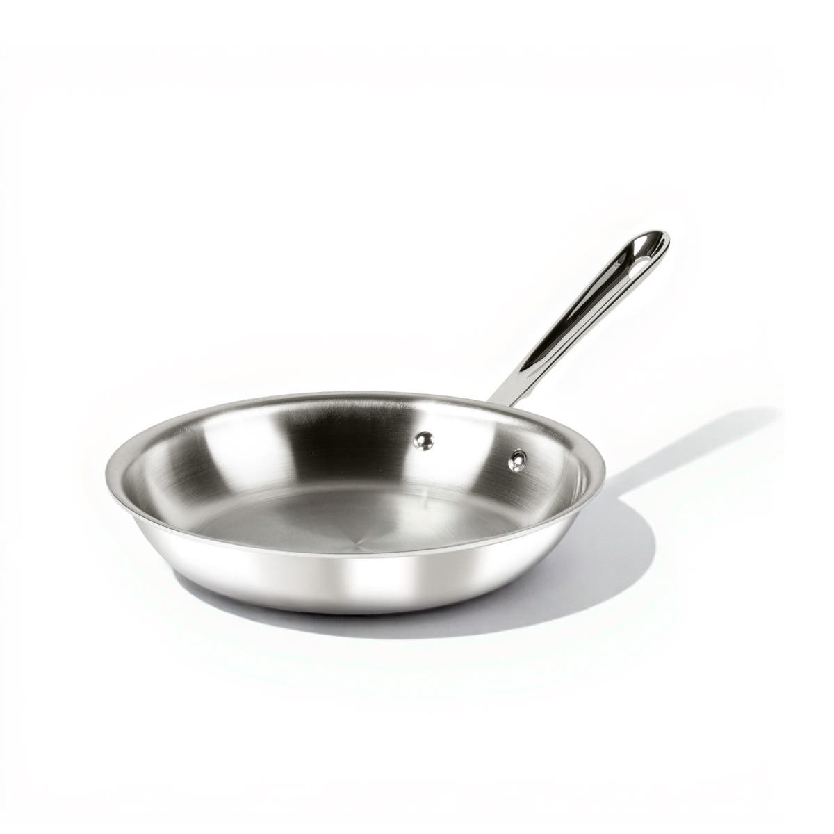 All-Clad D3 Stainless 10-inch fry pan, a polished stainless skillet with a riveted handle and flared rim, photographed against a white background