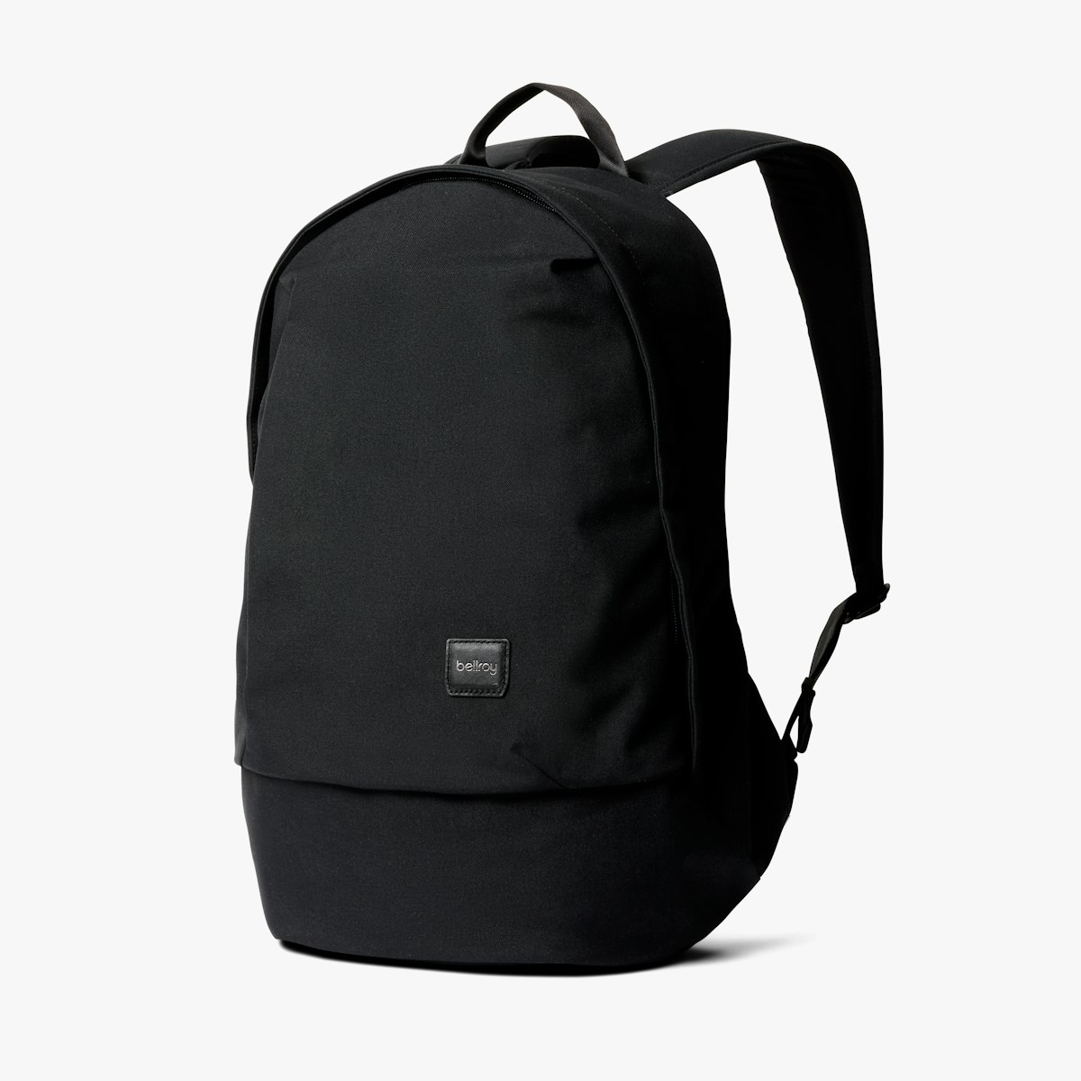 Black Bellroy Classic Backpack, front view, showing the front admin pocket, leather zip pulls and embroidered owl
