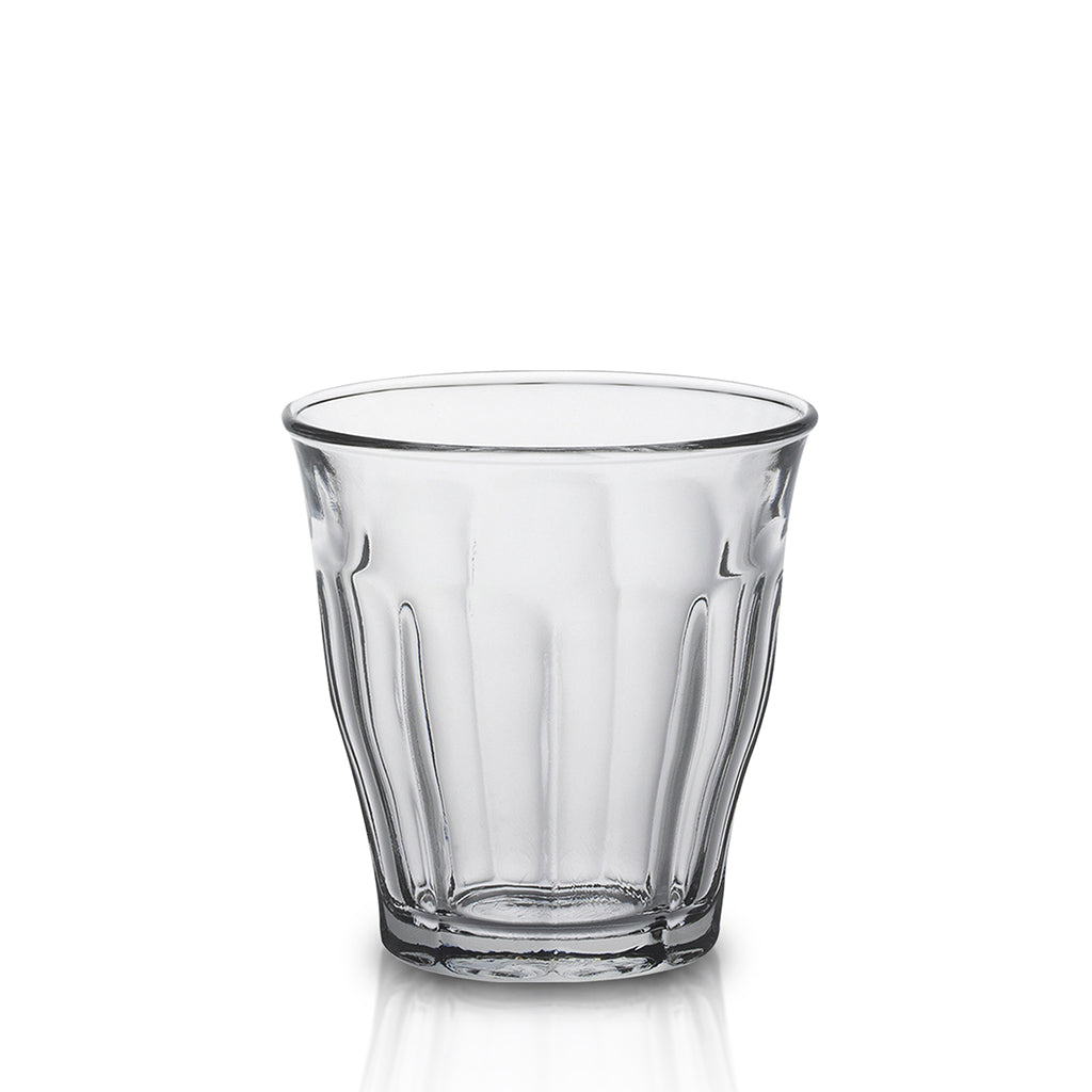Six clear Duralex Picardie tumblers in a stack