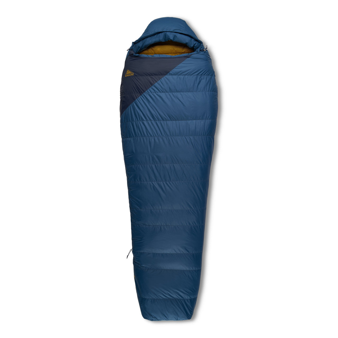 A blue semi-rectangular sleeping bag laid flat and seen from above on a plain white background, with a dark navy diagonal panel across the chest carrying a gold Kelty triangle logo, an amber lining visible inside the hood opening, horizontal quilted baffles down the length of the bag, a zipper pull hanging low on the left side, and a soft shadow beneath it