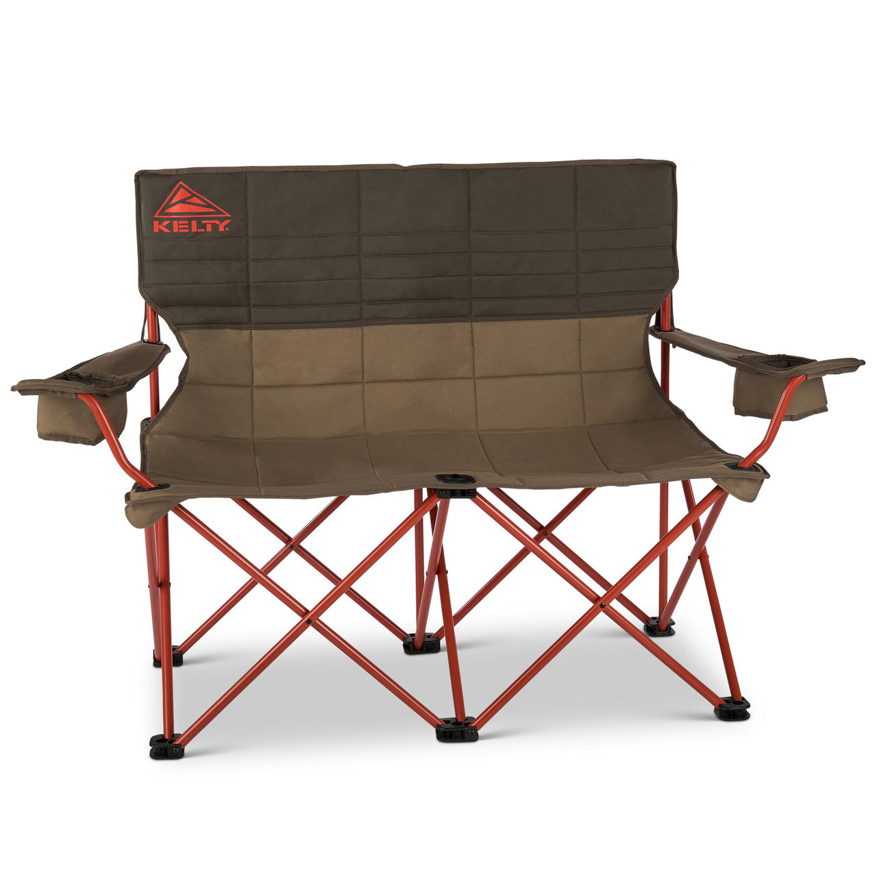 The Kelty Loveseat in Bungee Cord, opened and facing forward on a plain white background: a dark brown upper back panel with an orange Kelty triangle logo at its upper left, a mid-brown lower back and one-piece seat, a matte red round-tube steel frame crossing beneath the seat, black plastic feet on every leg, and a brown fabric beverage holder at the end of each armrest