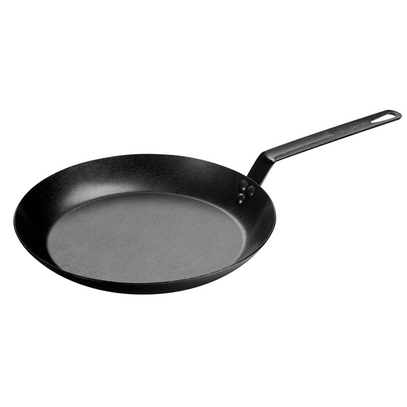 Black Lodge 12-inch seasoned carbon steel skillet with a long straight handle, viewed from above