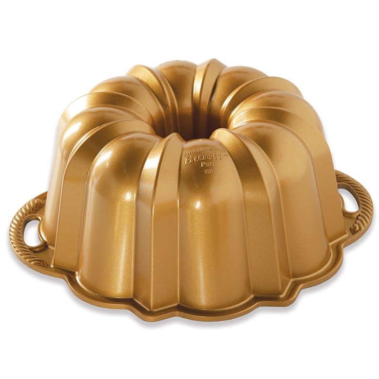 Nordic Ware Anniversary Bundt pan, a fluted cast aluminum ring pan with side handles