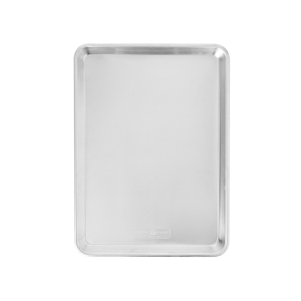 Rectangular silver aluminum half sheet pan with a low rolled rim, photographed from above