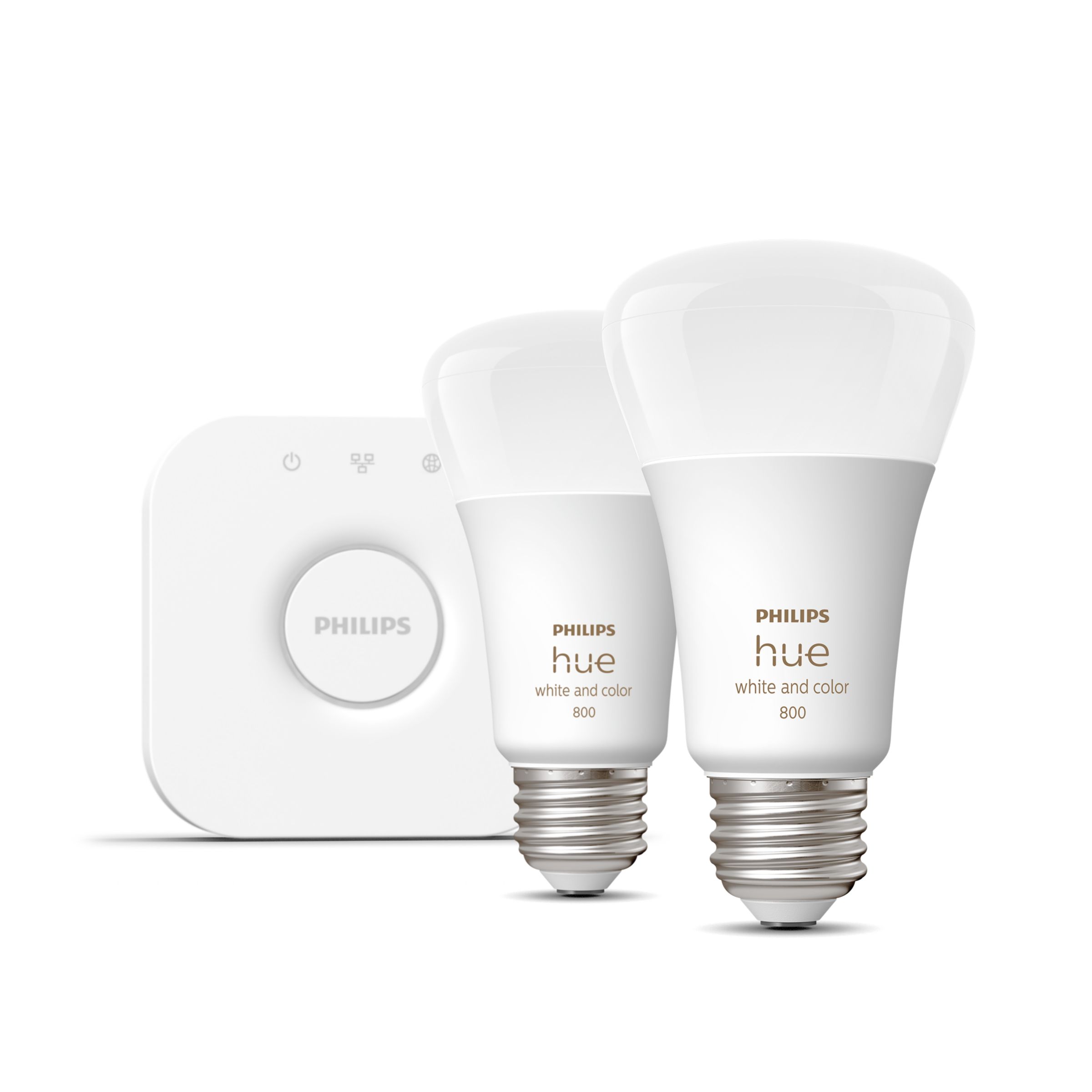 Two white Philips Hue A19 bulbs with E26 screw bases printed 'Philips hue white and color 800', beside a white square Hue Bridge with a round center button, on a white background