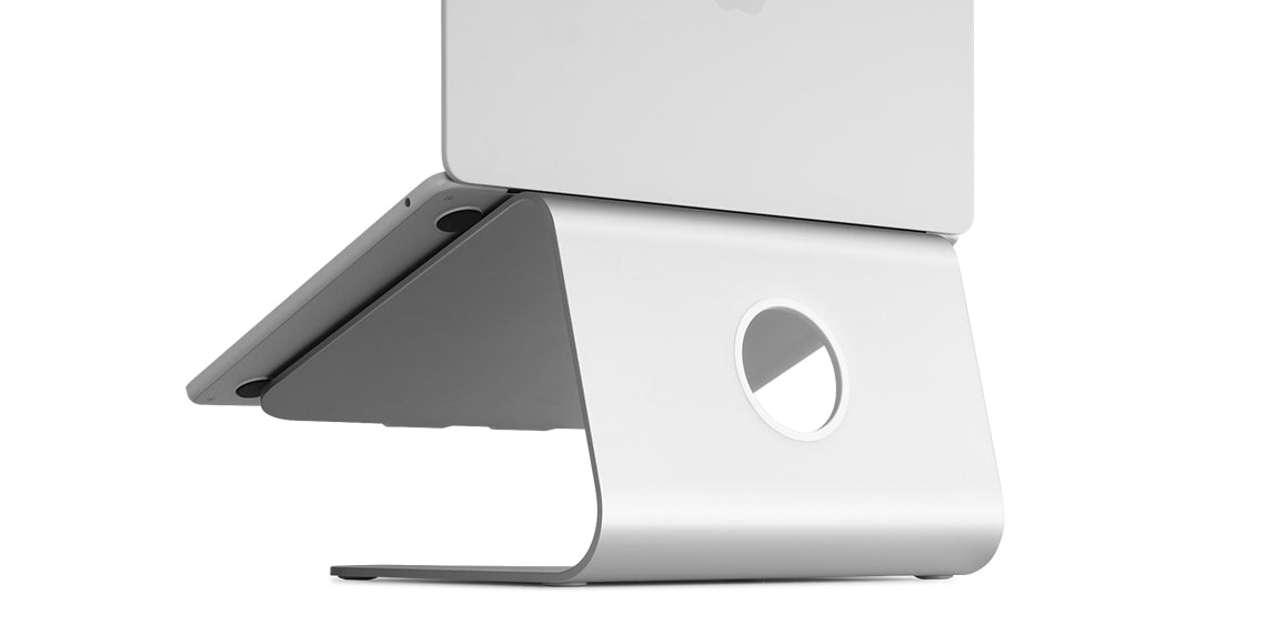 Silver Rain Design mStand laptop riser, a single curved sheet of anodized aluminum with a cable hole at the back