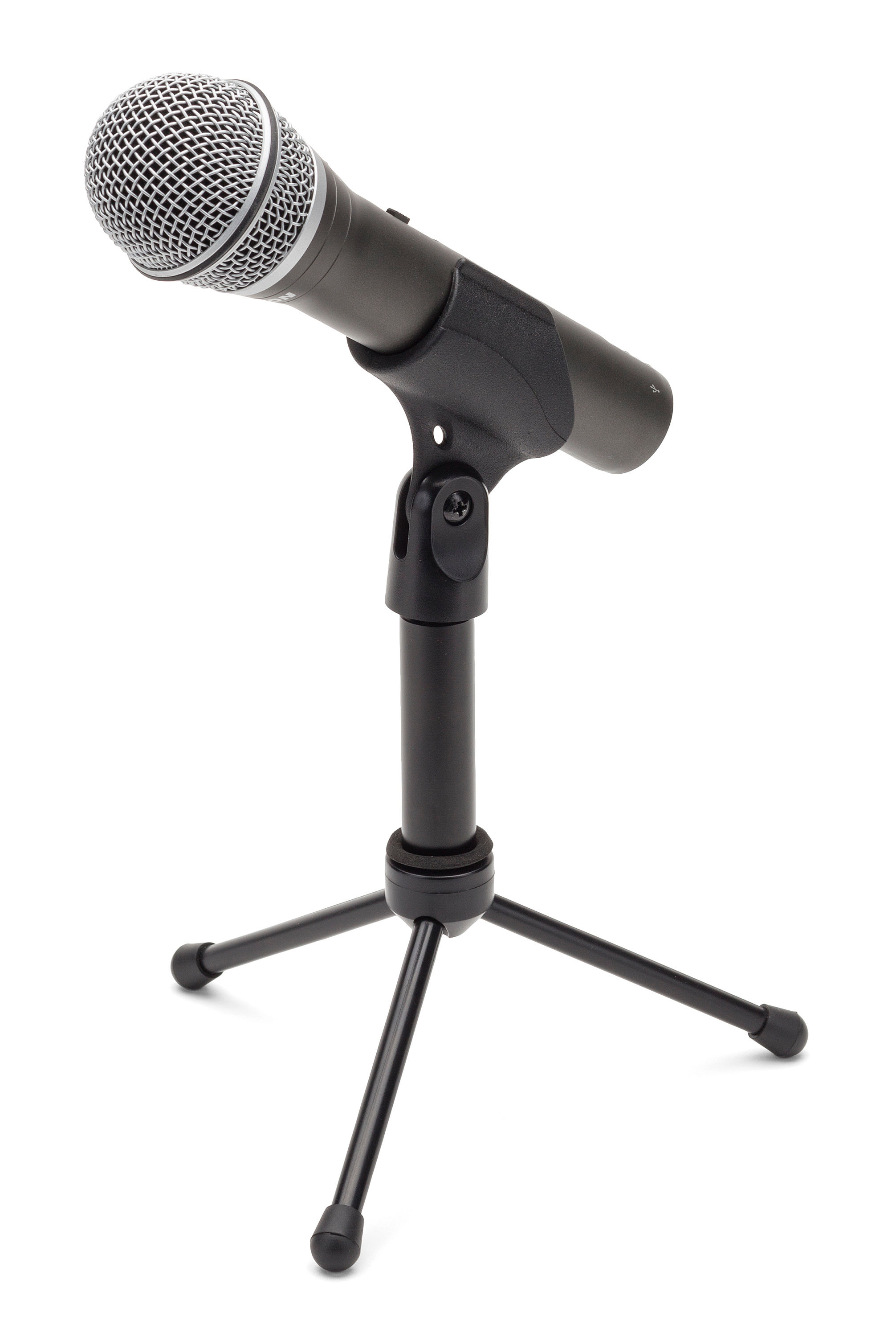 Samson Q2U dynamic microphone in black, seated in its mic clip on the small desktop tripod stand, silver ball grille angled to the upper left, on a plain white background