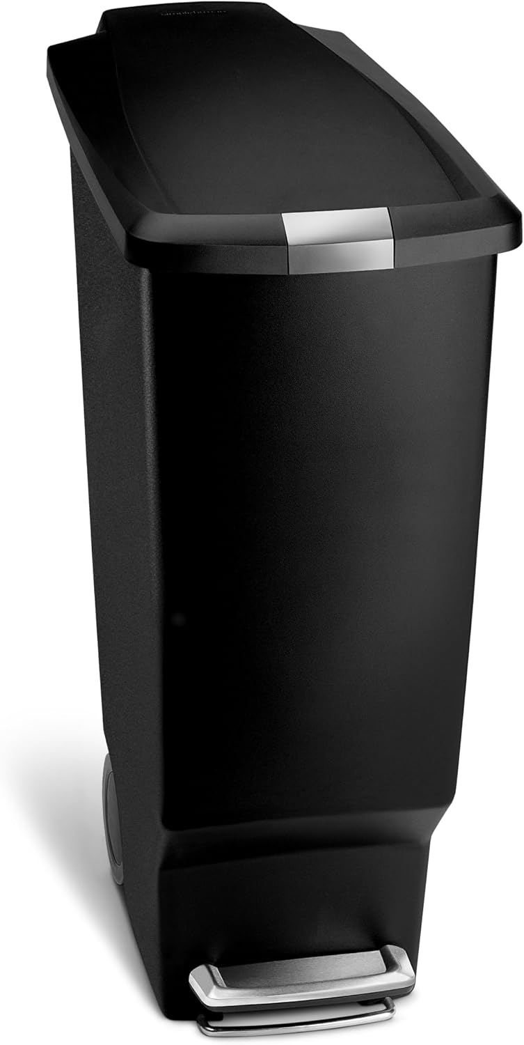 simplehuman 40-liter slim plastic step can in black, three-quarter front view on a white background, with a silver-toned strip at the front edge of the lid and a stainless foot pedal at the base