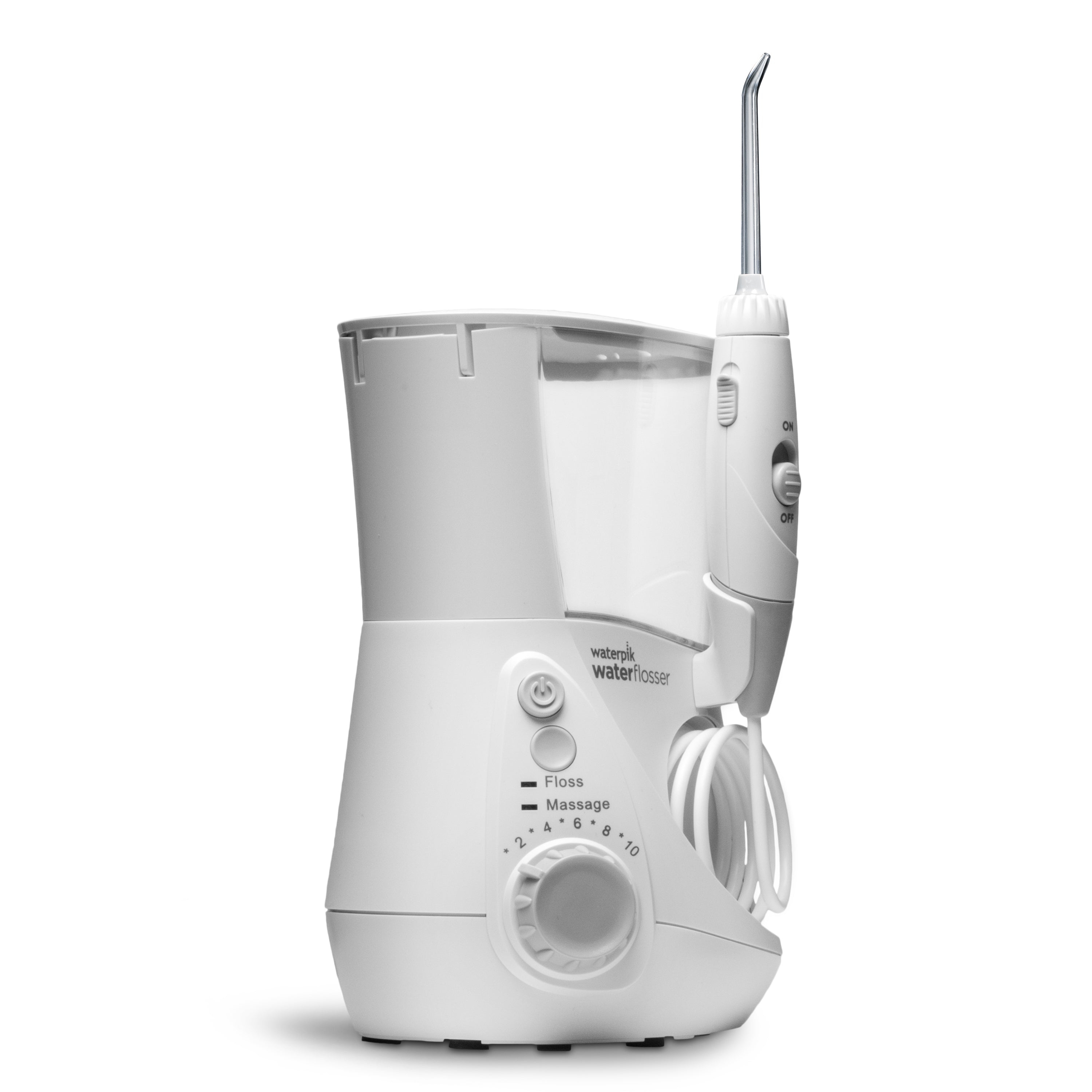 White Waterpik Aquarius WP-660 countertop water flosser on a plain white background, with the handle and its tip docked in the right-side cradle, the coiled hose below it, the waterpik waterflosser logo, a power button, a mode button with Floss and Massage labels, and a pressure dial marked 2 to 10 on the base